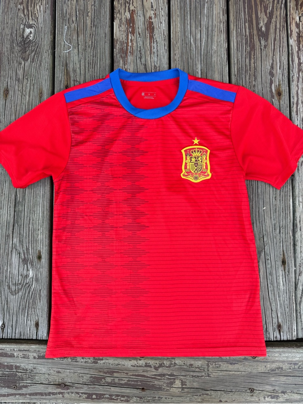 Mens Red Soccer Jersey with Blue Collar and Yellow Crest